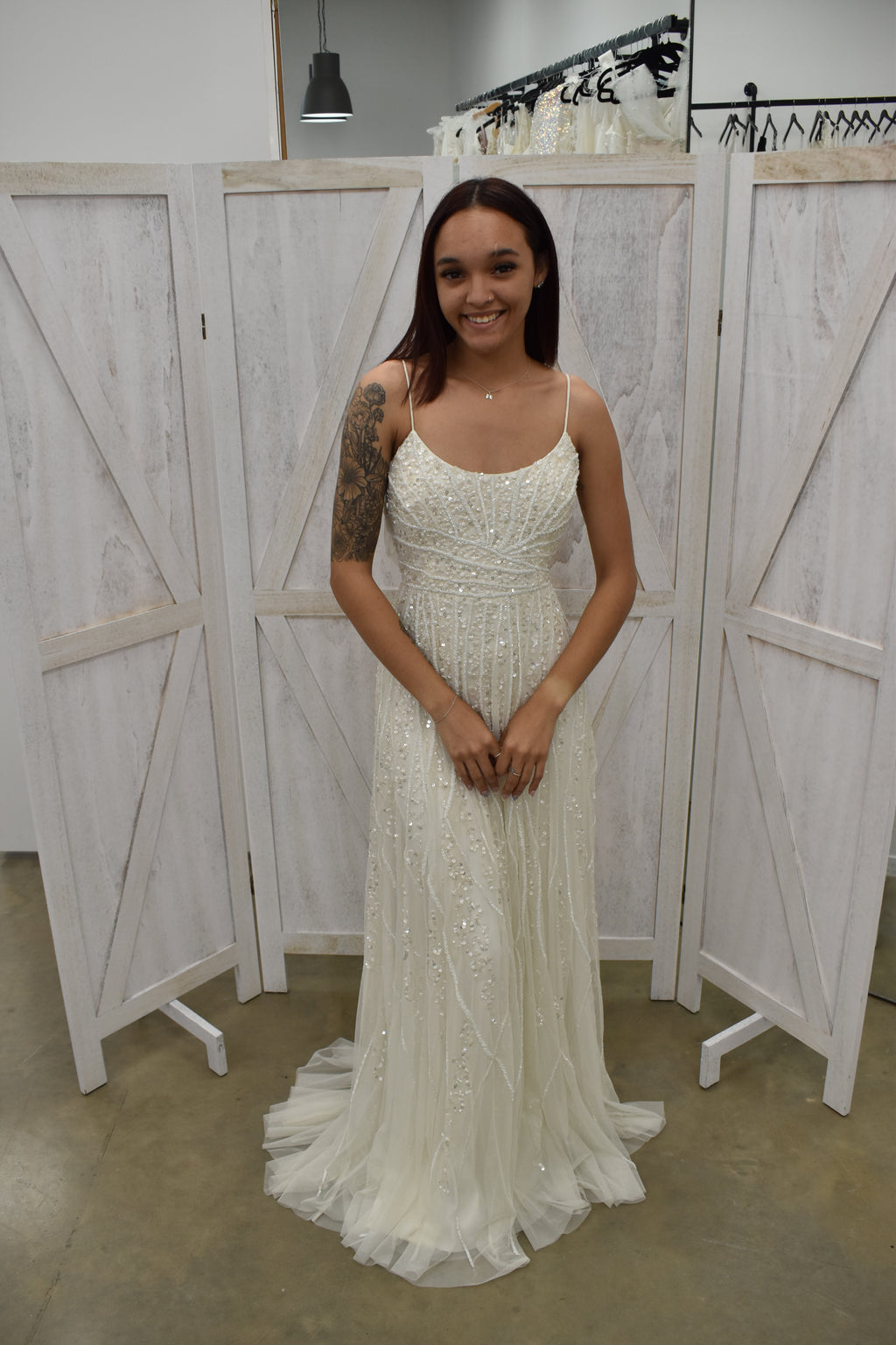 Ivory Beaded Spaghetti Strap Backless Wedding Gown with Feather Hem