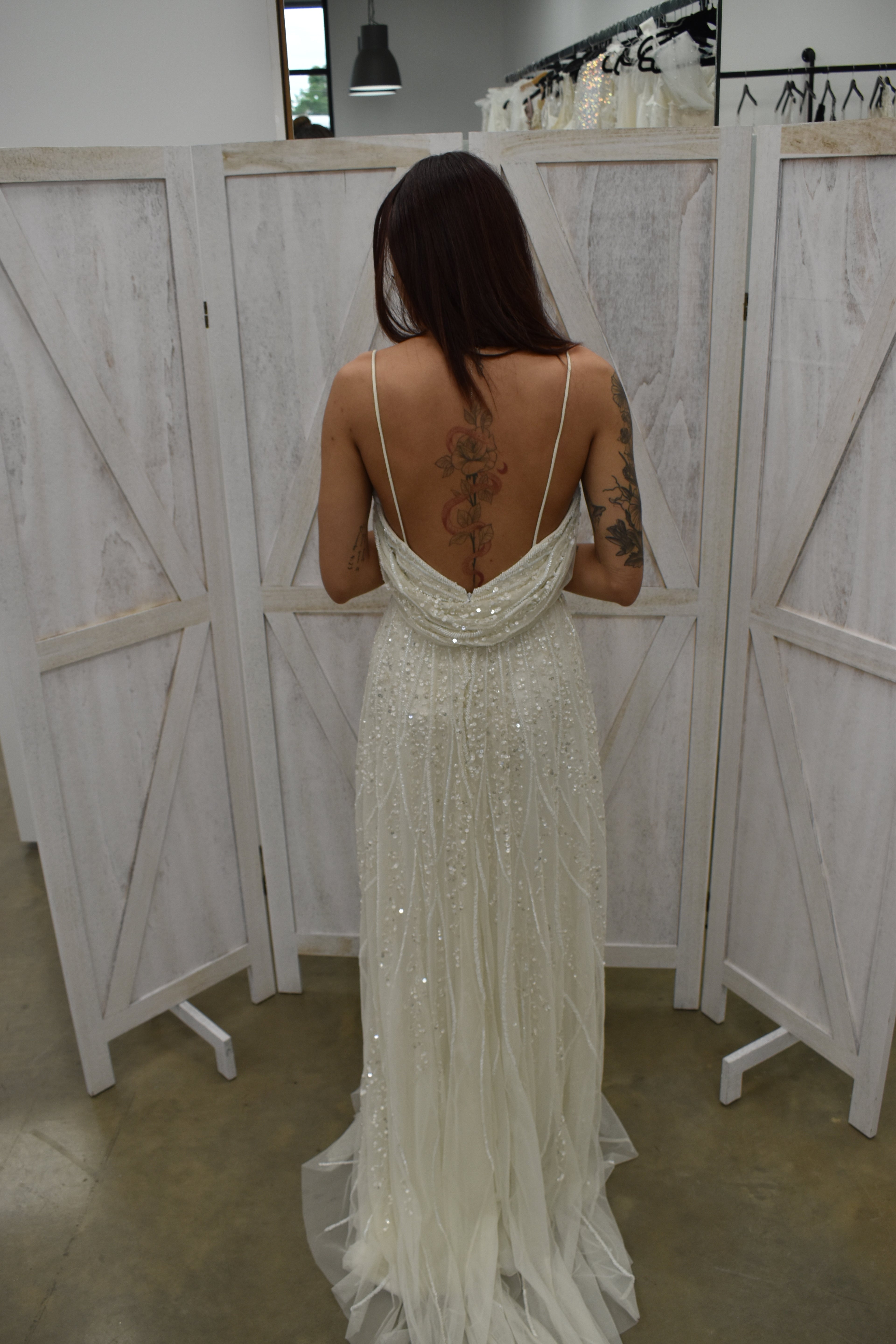 Ivory Beaded Spaghetti Strap Backless Wedding Gown with Feather Hem